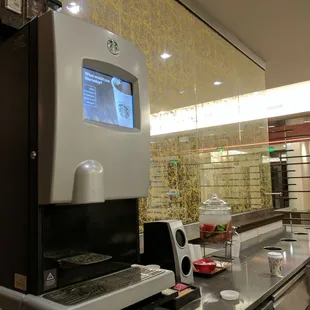 Complimentary Starbucks machine and watermelon H2O