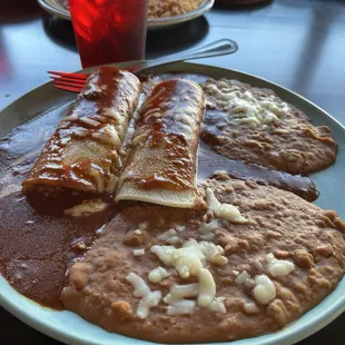 Enchiladas and refried beans