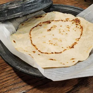 Flower tortillas nice on one side. Little crispy bird on the other.