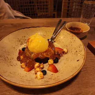 Pan De Elote, it had Carmel sauce and was delicious. Crispy on the out side, soft and warm on the inside.