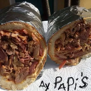 Tripleta Sándwich: Roast pork, honey ham, chicken, cheese, lettuce, tomato, mayo-ketchup garlic sauce