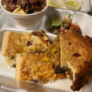 Mac and cheese quesadilla with brisket and grill brisket was  10/10