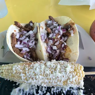 Spicy steak tacos and street corn. Yummy!