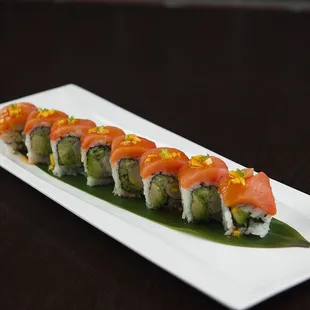 Passion Lobster Roll         Steamed lobster,avocado and cucumber inside, smoked salmon on top with sweet and sour mango salsa sauce