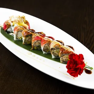 Spider King Roll    Soft shell crab tempura,mango,basil leaf,cucumber,topped with pepper tuna,eel and special sauce