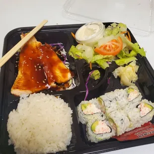 Salmon bento box with California rolls