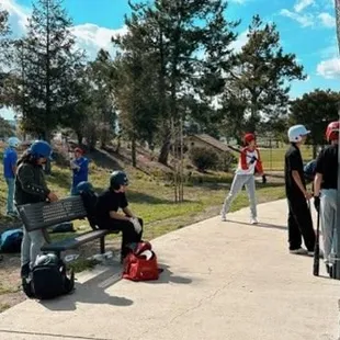 Team batting practice at Ayala batting cages.