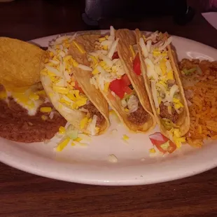 Order of Crispy tacos made to perfection Nice,hot,fresh! Beans and rice....absolutely exceptional!