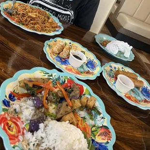 Shrimp pad Thai, Spicy Eggplant Basil and Jasmine Rice, Chicken Gyoza, Veggie Spring Rolls