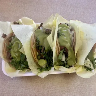 three tacos on a plate