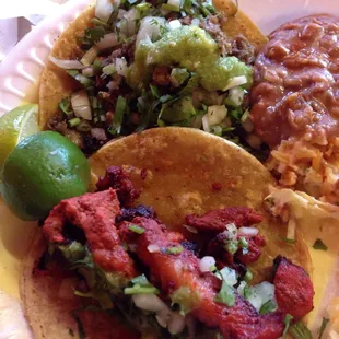 Pastor and lengua tacos $2