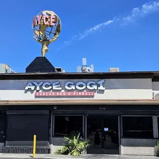 Where they get the man holding the globe?