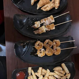 Gyoza Pork Bell Skewers Shrimp Skewers Fries