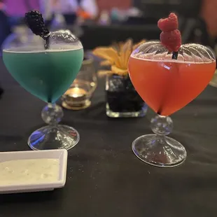 two cocktails on a table