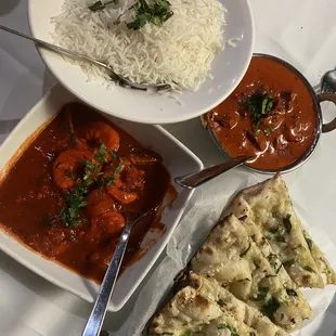 Garlic naan, shrimp vindaloo, and lamb makhani