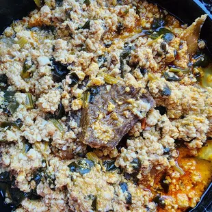 Egusi with Fufu. It was really good and flavored well. It tasted fresh and was very hot.