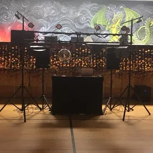 a stage with speakers and lights