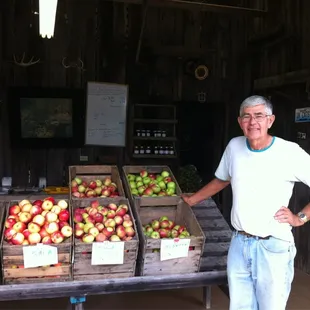 Larry Ayres displays his freshest finest apples.