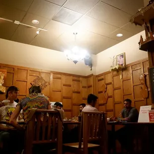 a group of people sitting at a table