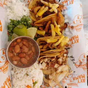 Four tacos and side of beans and rice! The food is very good and fresh! My third time having food from here!