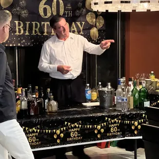 Dan (bartender) singing Happy birthday to my husband.