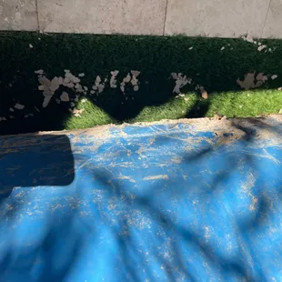 Dirt on bounce house and falling off into yard.