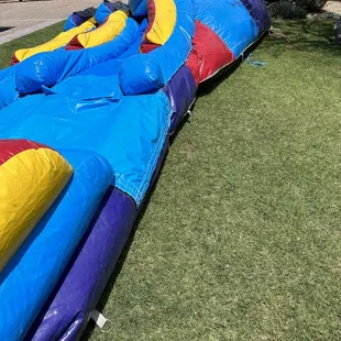 Bounce house plugged in and "installed" without stakes securing it to the ground.
