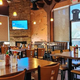 a restaurant with tables and chairs