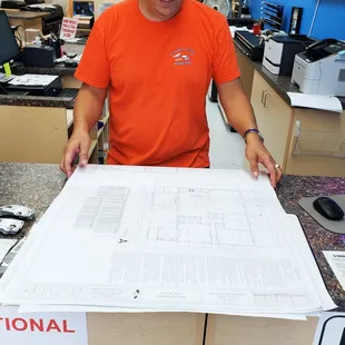 We can scan and print blue prints in the same day