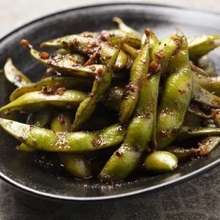 HAPPY HOUR Tuesday-Thursday 5-7pm Friday 5-6pm.               Spicy garlic edemame
