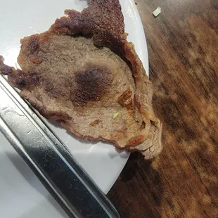 Ugly microwaved meat.
