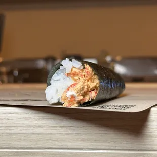 A generously stuffed lobster hand roll
