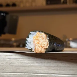 My favorite of the night: bay scallop hand roll in a creamy mentaiko sauce