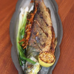 a whole fish on a platter