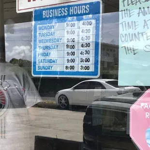a business hours sign