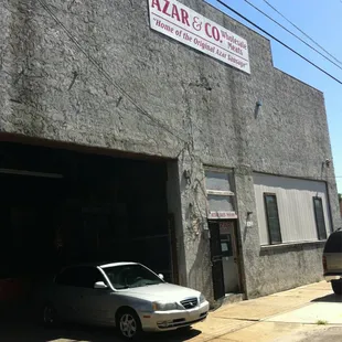 a car parked in front of a building