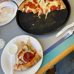 Pizza with pineapple, peppers, and pepperoni