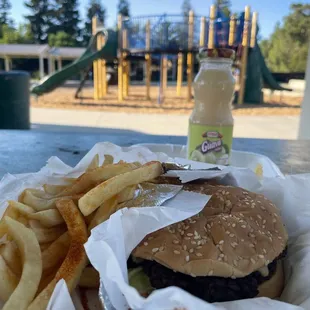 Chickens burger with fries and drink