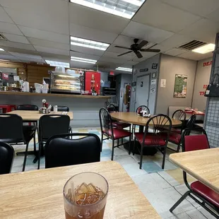 a glass of iced tea on a table