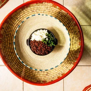 a bowl of chili and rice