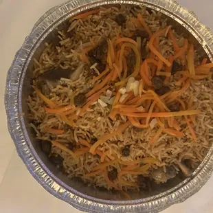 Kabuli Palow Lamb buried in the sweet and savory rice