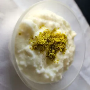 Ferni (milk custard with almonds, pistachios, cardamom, and rosewater).