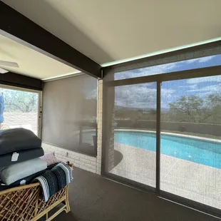 Roller shades for Arizona room in Green Valley Arizona. Options include; reverse roll, 3% screen fabric, stainless steel chain.