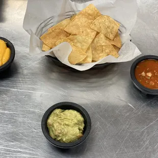 Our Fresh Home Made Always Hot Chips, Guac, Cheese Dip and our Always Fresh Salsa