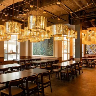 a dining room with tables and chairs