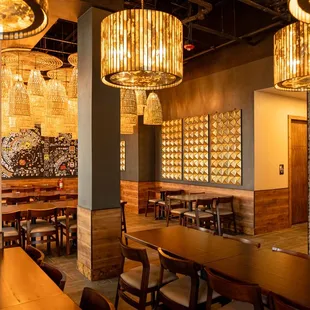 a dining area with tables and chairs