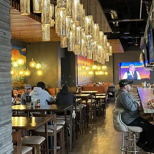 The bar seating area-counter, high tops or booths