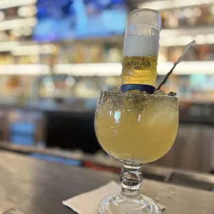 a glass filled with a drink