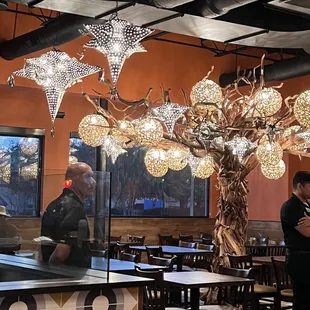 a man standing in a restaurant