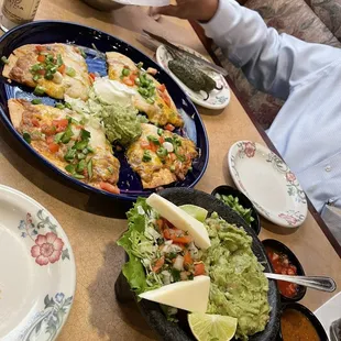 Mexican pizza on quesadilla tortilla and table side guacamole